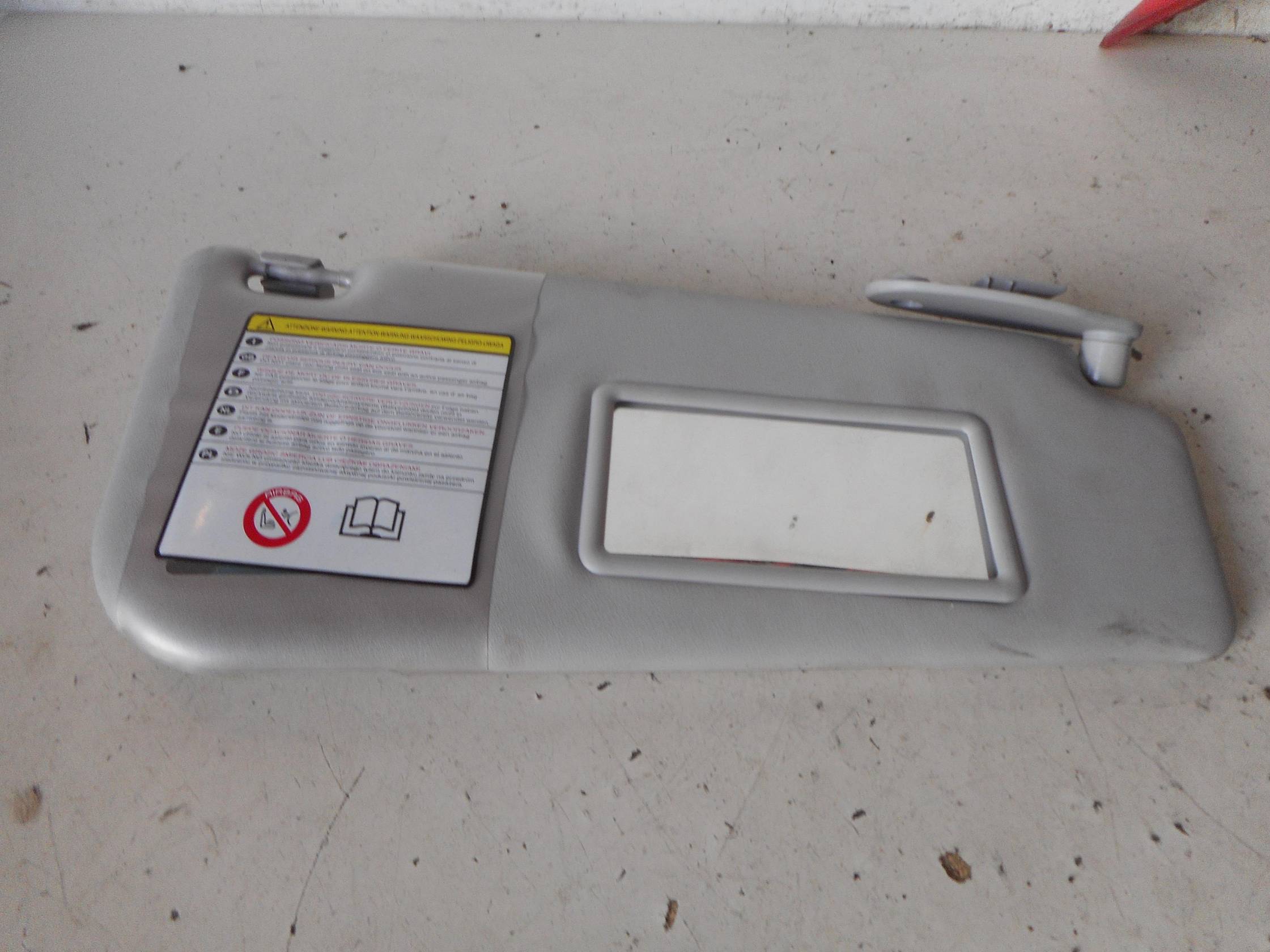 Aletta parasole parabrezza dx.